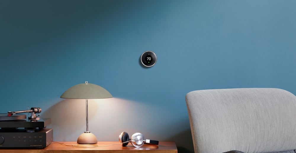 Nest thermostat mounted on a wall