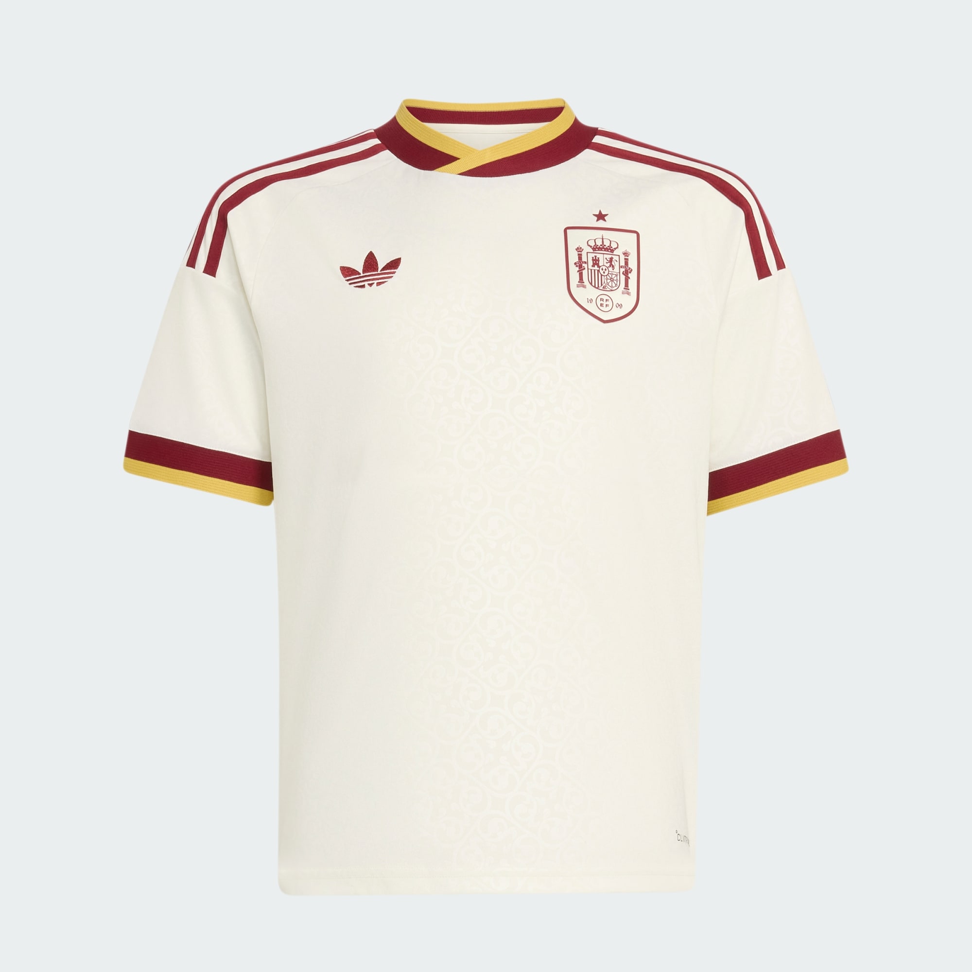 Japan away kit in beige with rainbow pin striping and black details